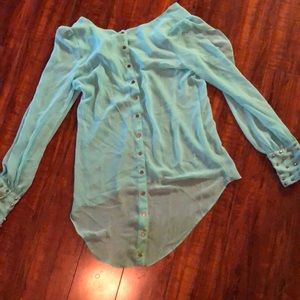 Mint blouse with studded cuffs